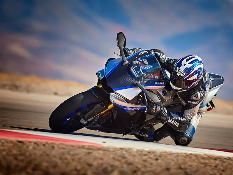 Yamaha supersport motorcycle cornering on a race track