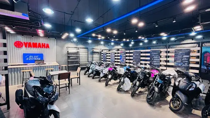 Yamaha bikes and scooters lined up in the Abacus Automotive showroom